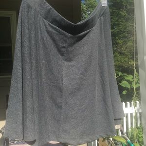 Grey Skirt. **Proceeds to Charity**